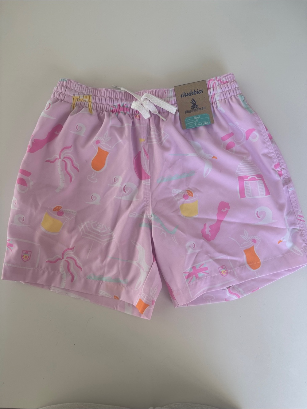 chubbies Pastel Pink Tropical Cocktail Swim Shorts